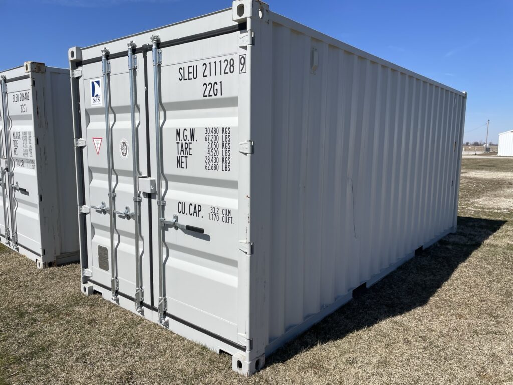 White storage container on grass under blue sky in Marion, Ohio.