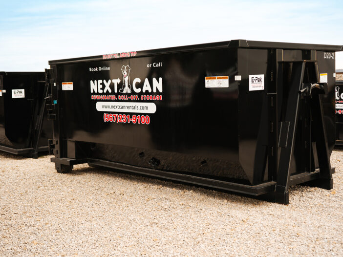 Side view of a black Next Can dumpster featuring the company's logo and contact information, promoting dumpster rental services in Marion, Ohio.
