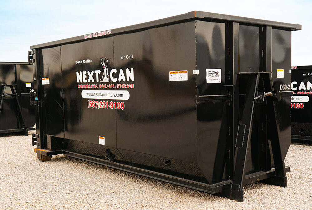 Next Can roll-off dumpster ready for delivery to a cleanup project